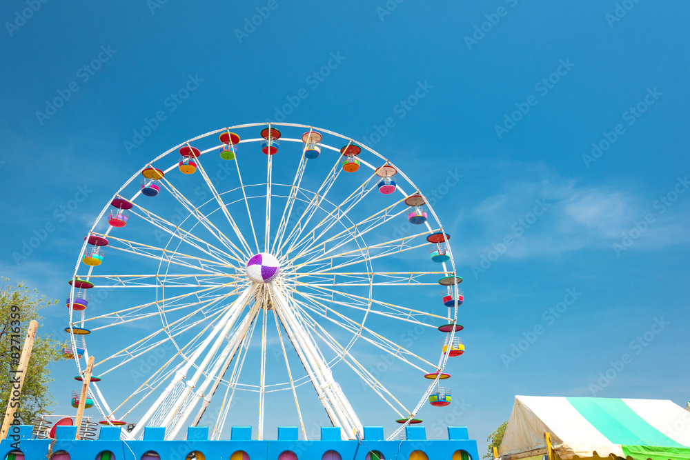 Giant ferris wheel against clear sky at the amusement