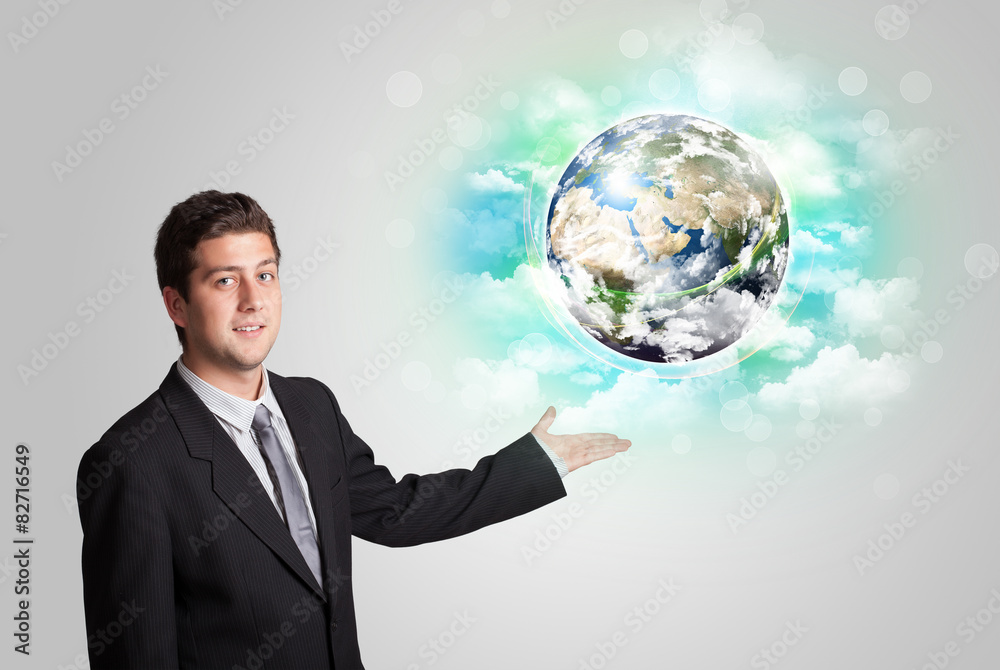 Young man with earth and cloud concept Young man with earth and cloud concept