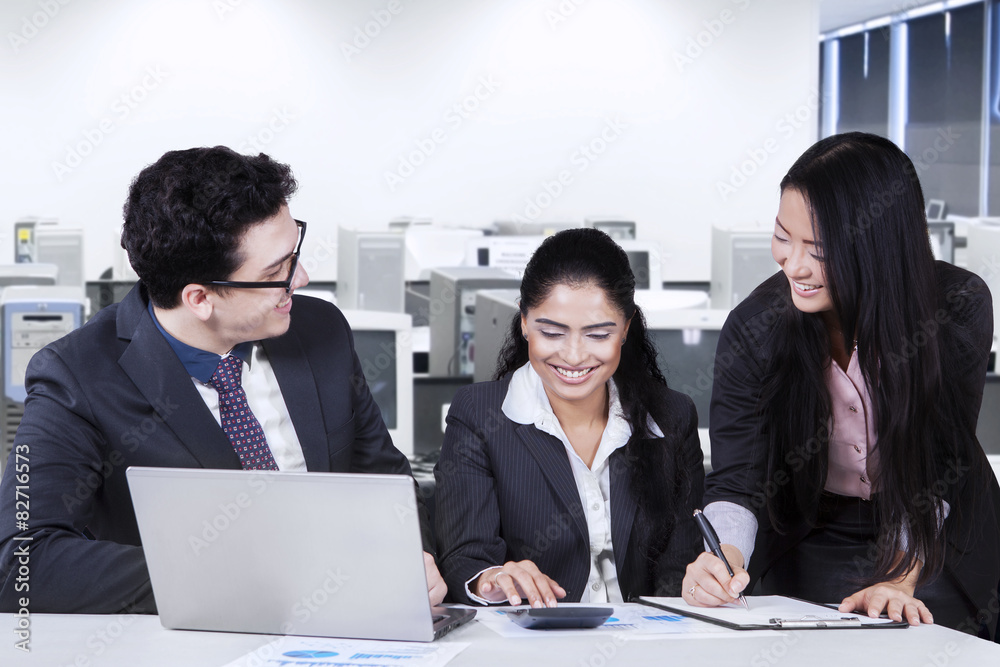 Multiracial business team working in office Multiracial business team working in office