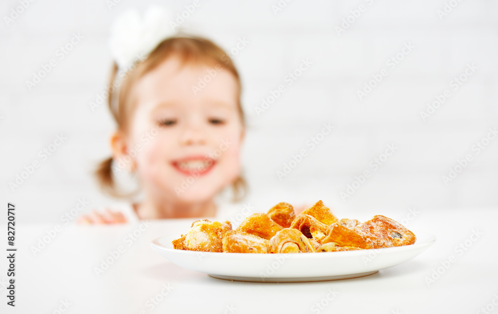 happy child girl eats biscuits, cookie happy child girl eats biscuits, cookie
