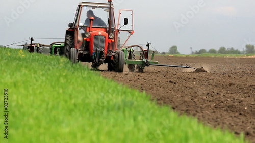 Spring sowing corn with a tractor and a planter