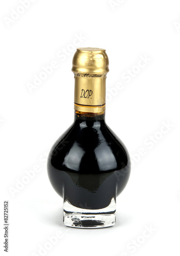 Traditional italian balsamic vinegar inside a special bottle iso
