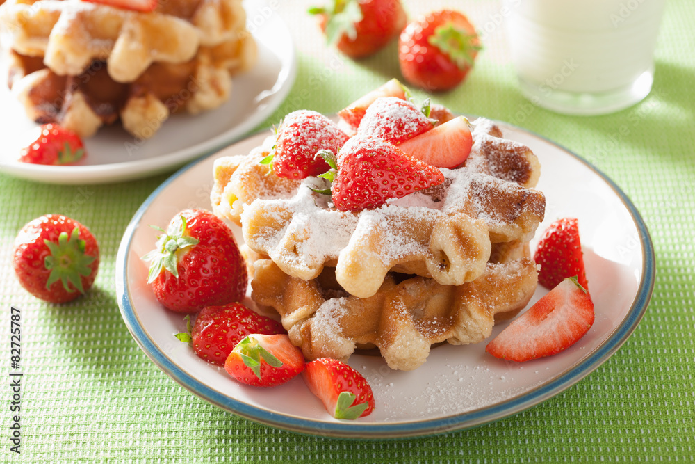 belgian waffles with icing sugar and strawberry belgian waffles with icing sugar and strawberry
