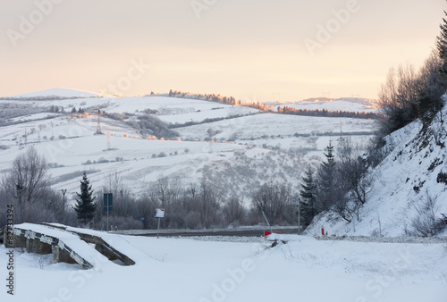 Sunrise Carpathian mountain winter view.