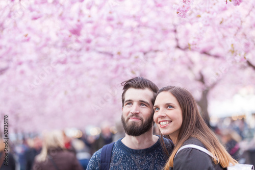 Hipster couple portrait in Stockholm with cherry blossoms © william87
