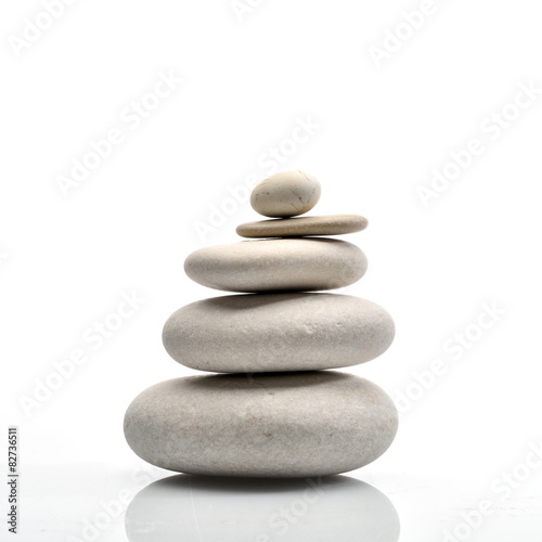 Canvas Print pile of stones isolated on white background