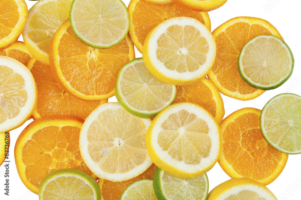 Sliced citrus fruits on a white background