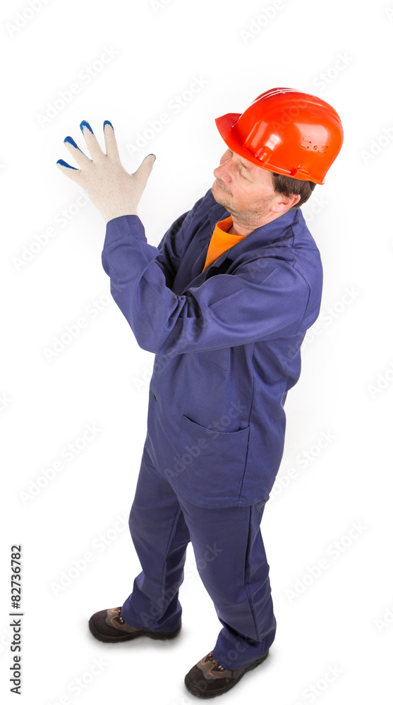 Worker in red protective helmet. 