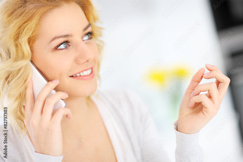 Woman talking on the smarphone Woman talking on the smarphone