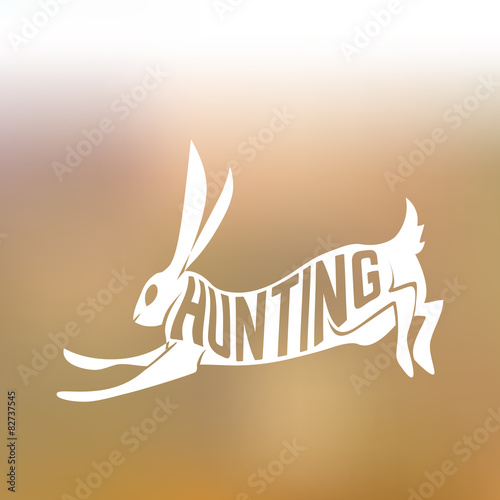 Creative design of running rabbit inside hare silhouette on