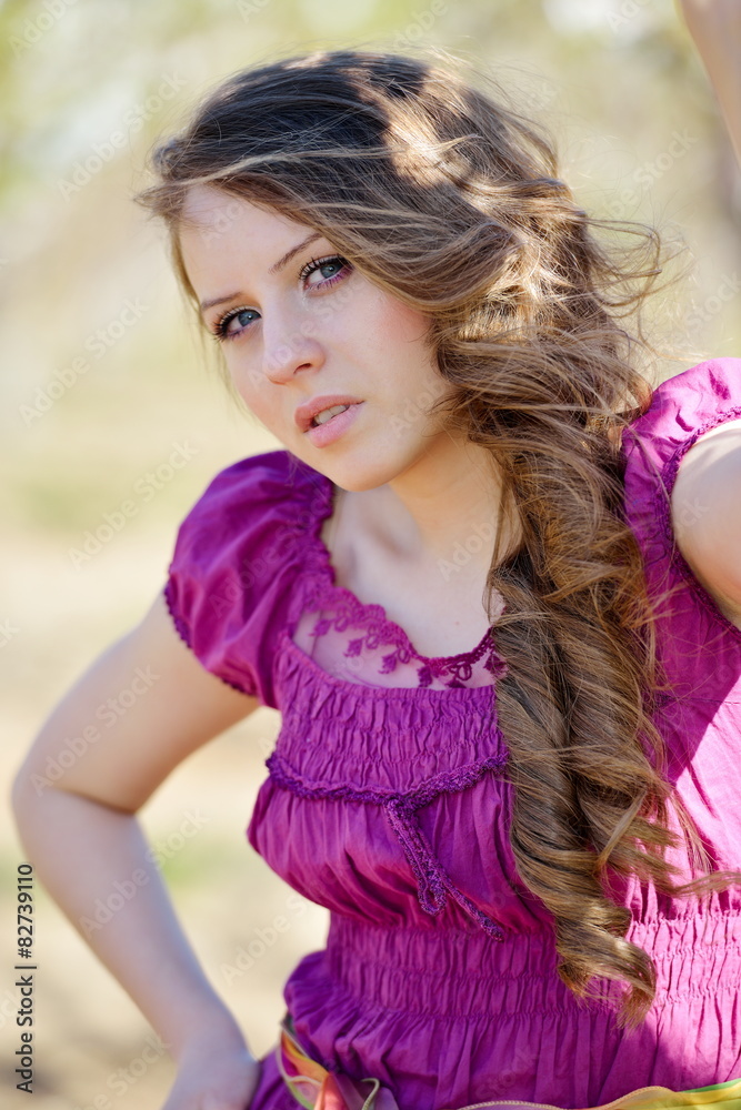 Naklejka premium young beautiful woman portrait outdoor