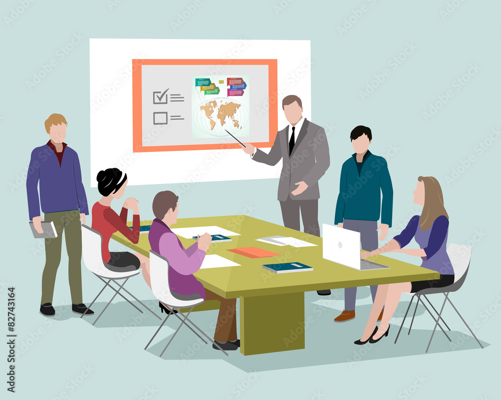 People talking and working at the computers in office