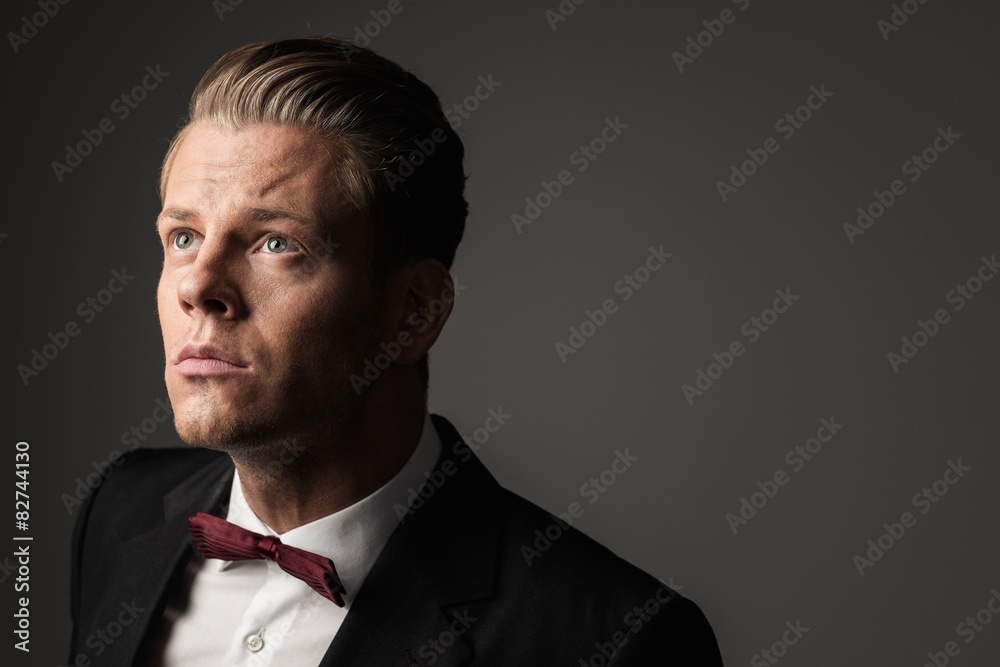 Sharp dressed fashionist wearing jacket and bow tie Sharp dressed fashionist wearing jacket and bow tie
