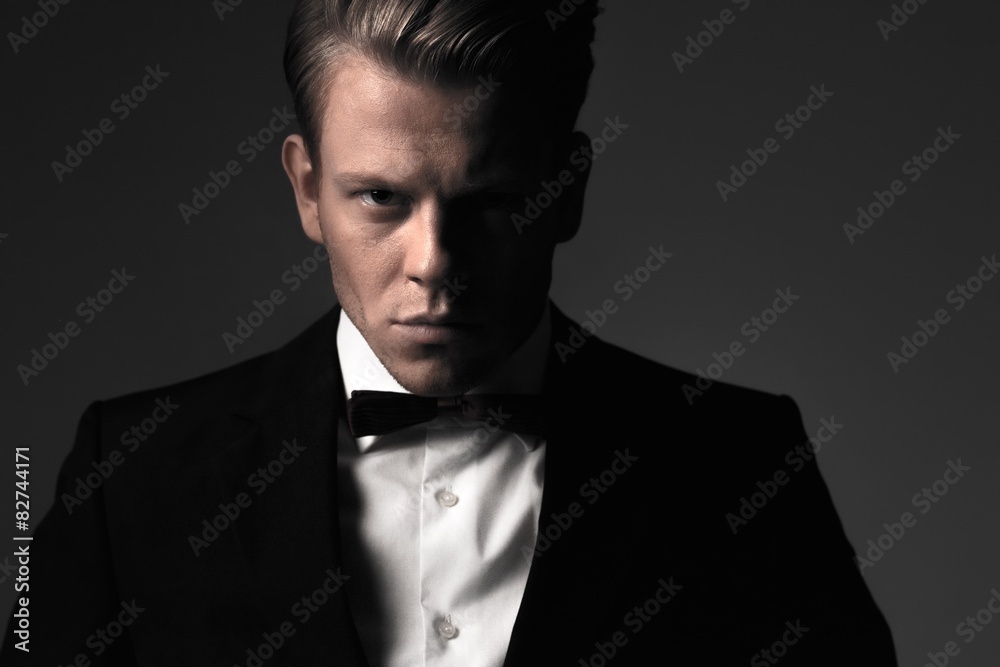 Sharp dressed fashionist wearing jacket and bow tie Sharp dressed fashionist wearing jacket and bow tie