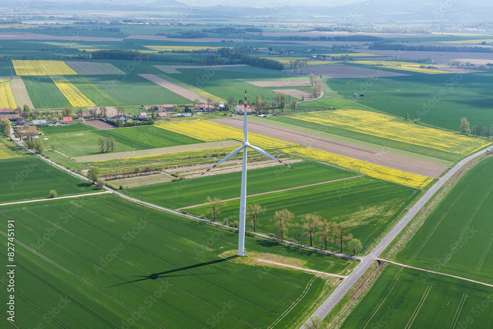 aerial view of wind turbine on a field