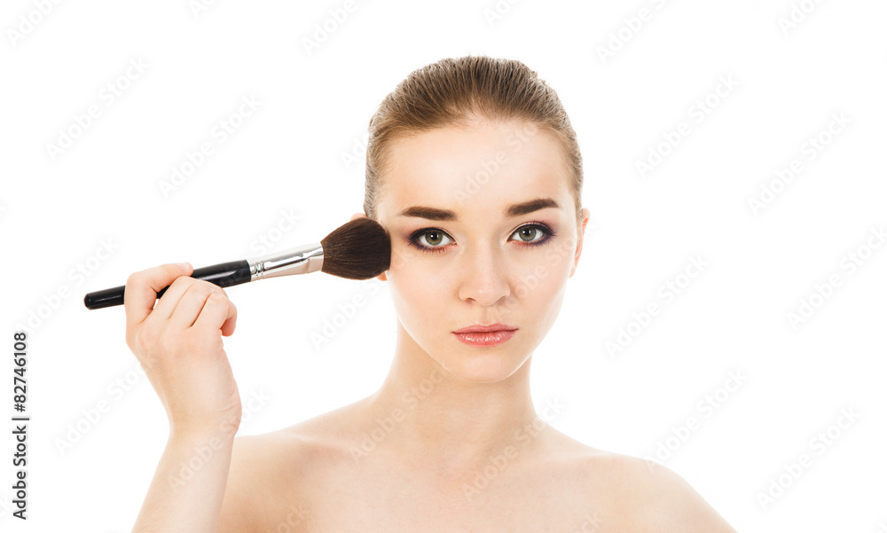 beautiful woman applying cosmetic with brush beautiful woman applying cosmetic with brush