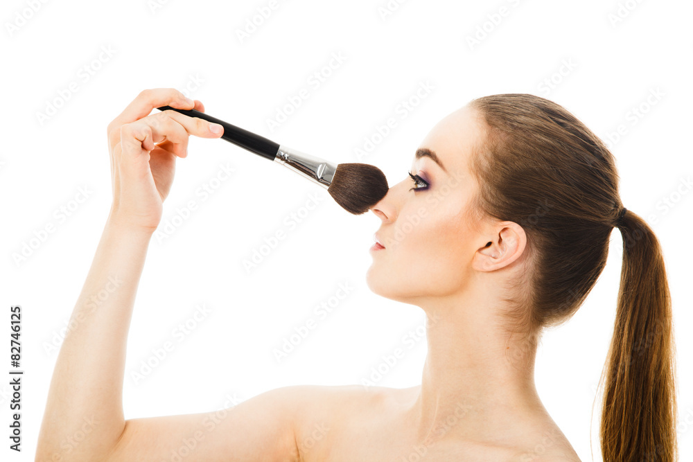beautiful woman applying cosmetic with brush beautiful woman applying cosmetic with brush