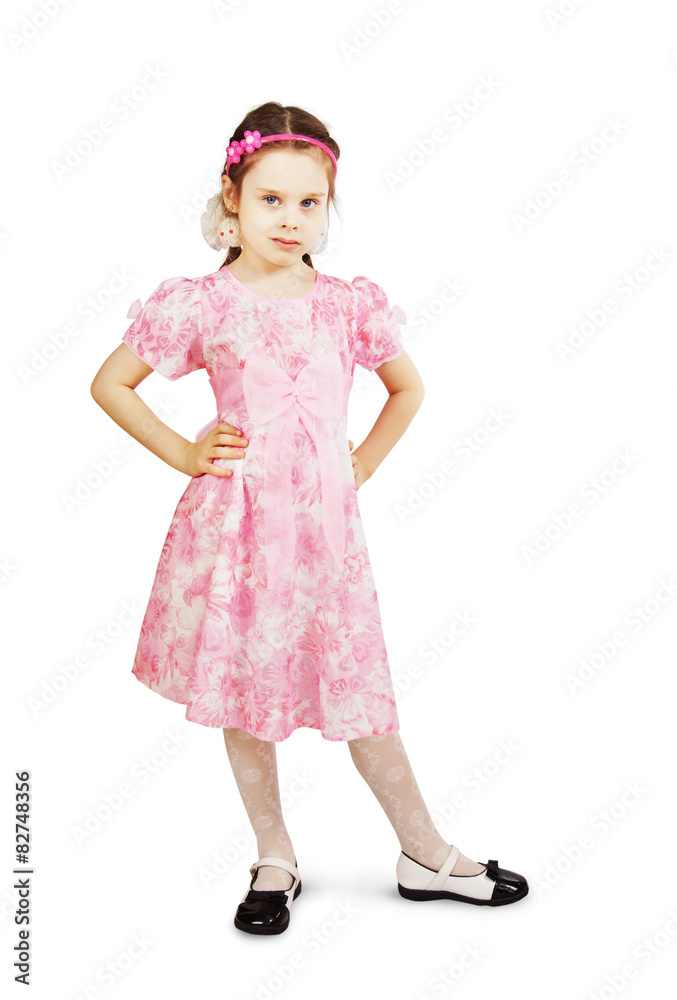 Little pretty girl in beautiful pink dress