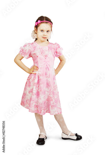 Little pretty girl in beautiful pink dress