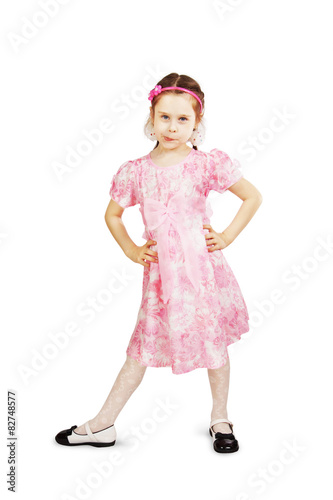 Little pretty naughty girl wearing beautiful pink dress