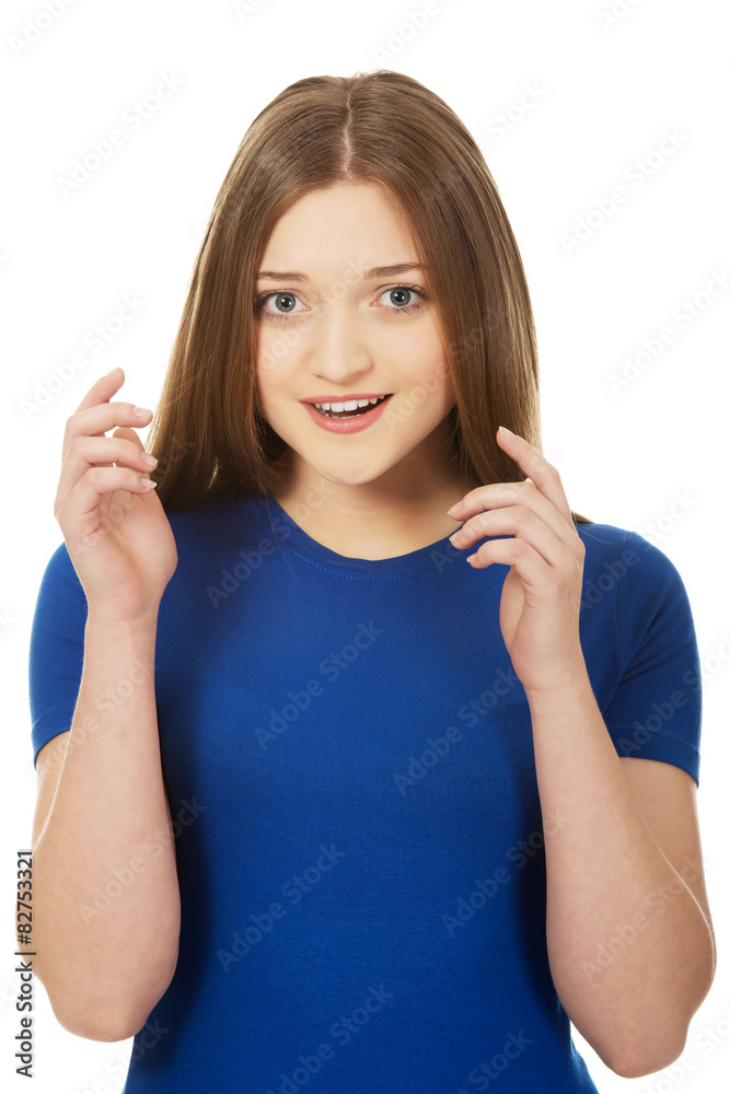 Fototapeta premium Frustrated young woman screaming.