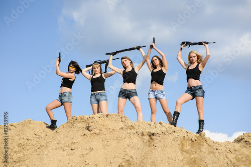 Beautiful army girls with guns