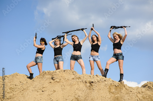 Beautiful army girls with guns