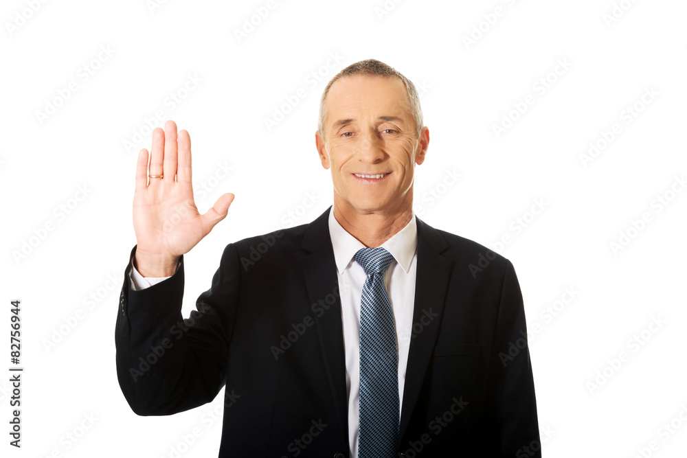Businessman pressing abstract screen Businessman pressing abstract screen