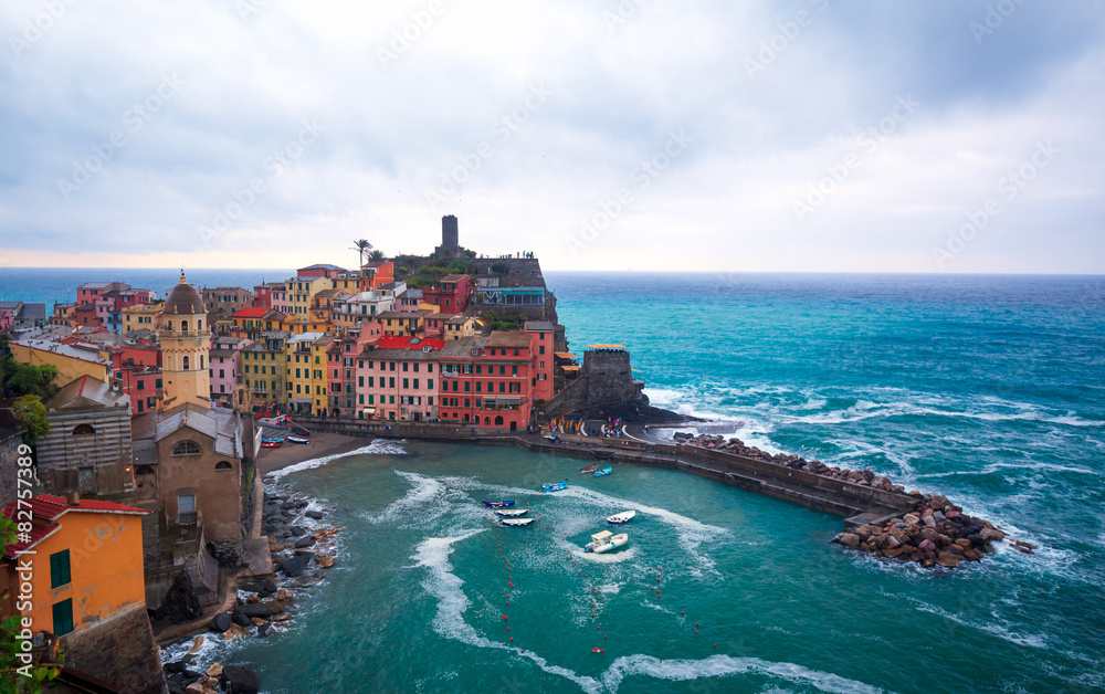 Ligurian Sea and harbor in colorful village Vernazza, Italy