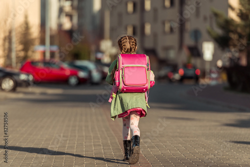 little  girl going to school © tan4ikk