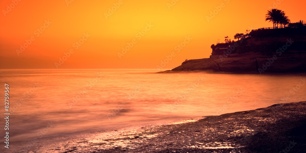 Orange evening on the shores of the Atlantic Ocean