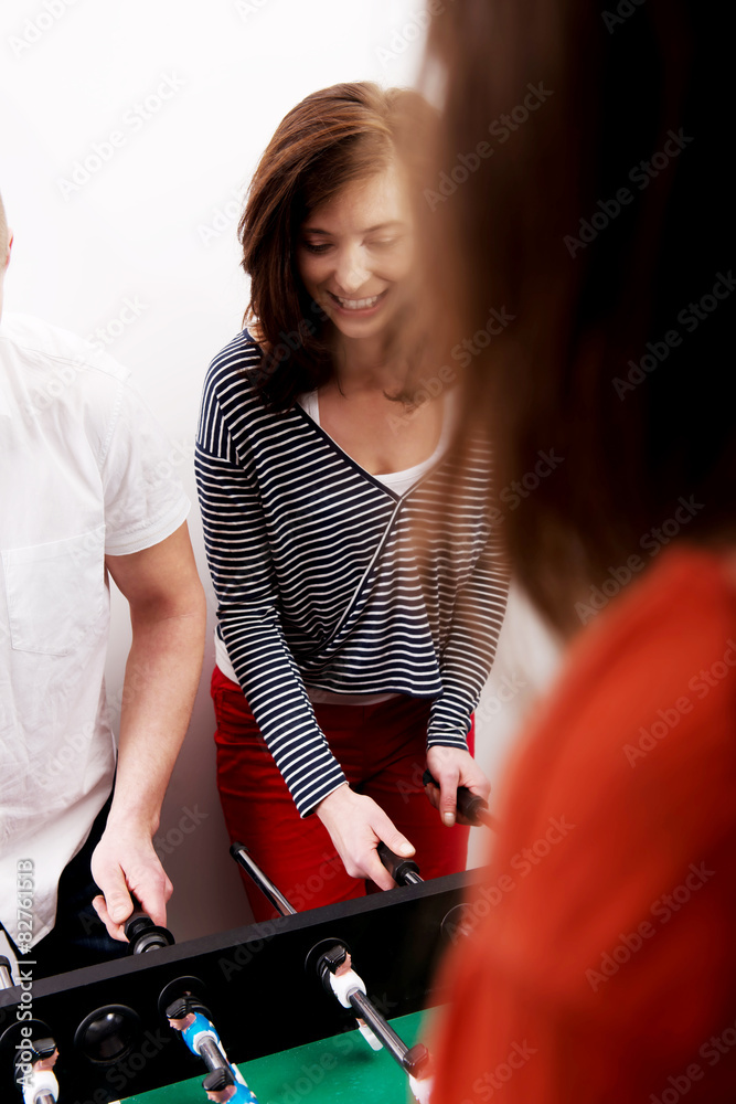 Fototapeta premium Friends playing table football.