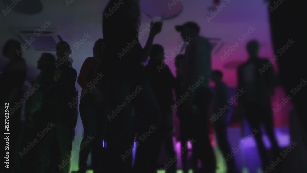 Silhouettes of nightclub guests dancing, having drinks, chatting Silhouettes of nightclub guests dancing, having drinks, chatting