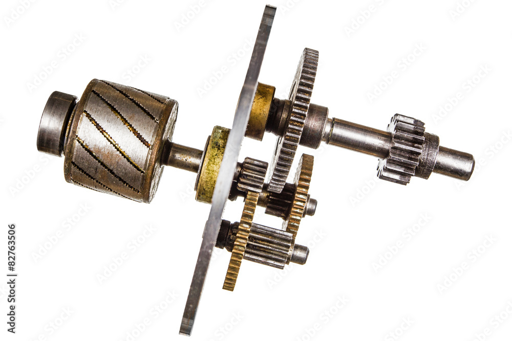 Gear wheels of reducer motor, isolated on white background Gear wheels of reducer motor, isolated on white background