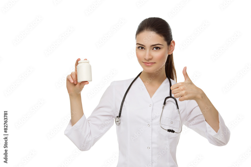 Woman doctor holding pill container and thumb up Woman doctor holding pill container and thumb up