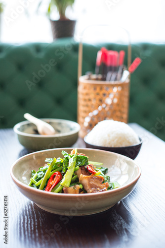 Thai foods. Crispy pork belly with Chinese brocoli