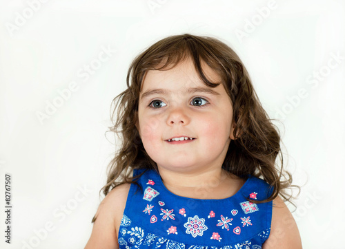Beautiful toddler in a flowered dress