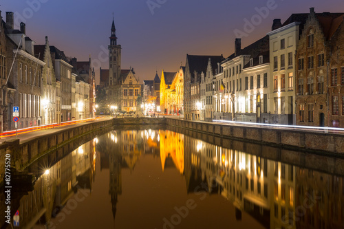 Historic medieval buildings in Bruges, Belgium at night.