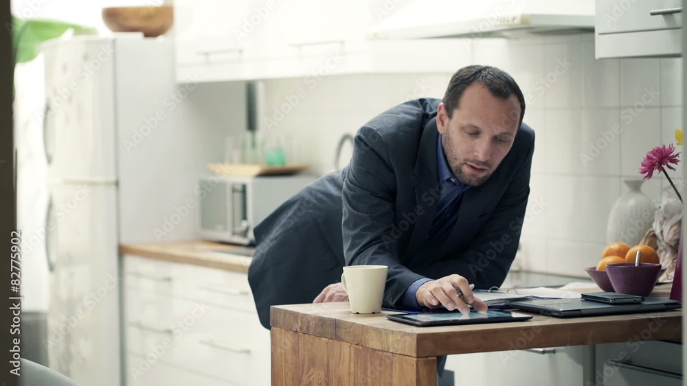 Businessman working with tablet computer Businessman working with tablet computer
