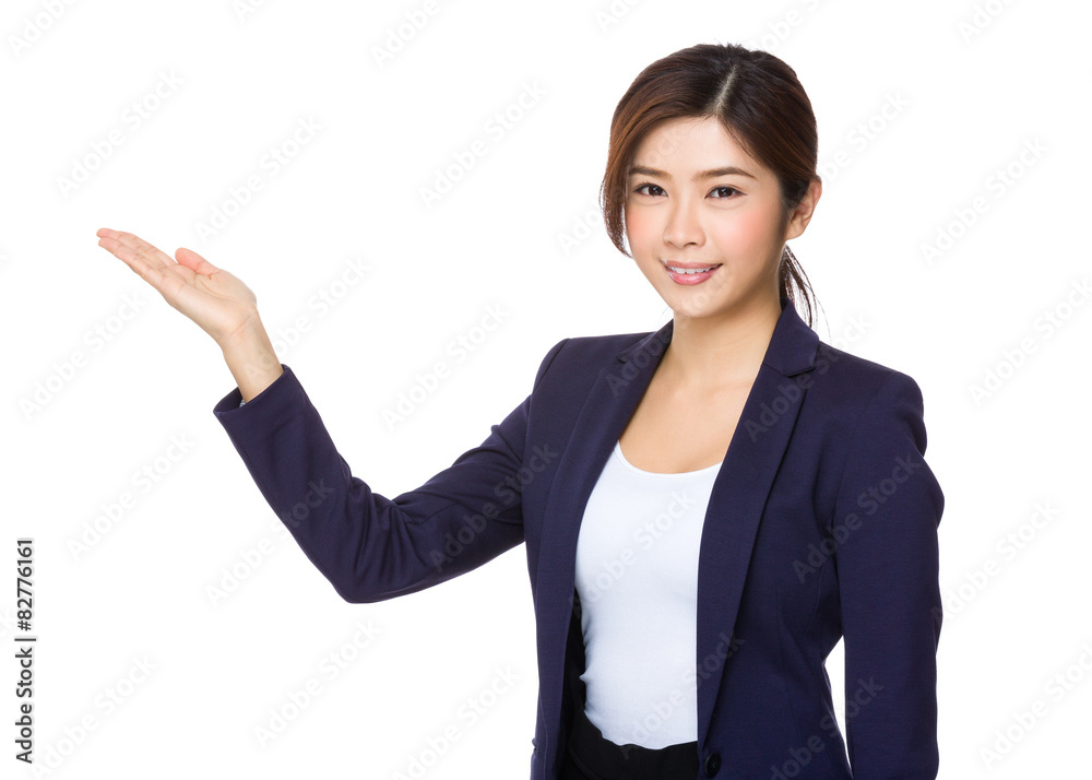 Businesswoman with hand showing blank side Businesswoman with hand showing blank side