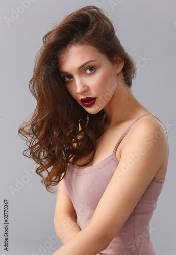 Portrait of beautiful woman , isolated on gray background