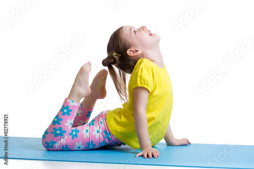 Child doing fitness exercises