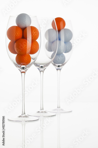 Wineglass with golf balls