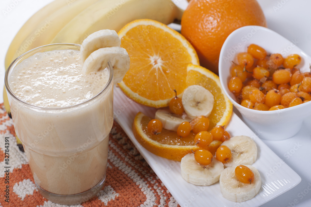 Smoothie of banana, orange juice , frozen sea-buckthorn with y Smoothie of banana, orange juice , frozen sea-buckthorn with y