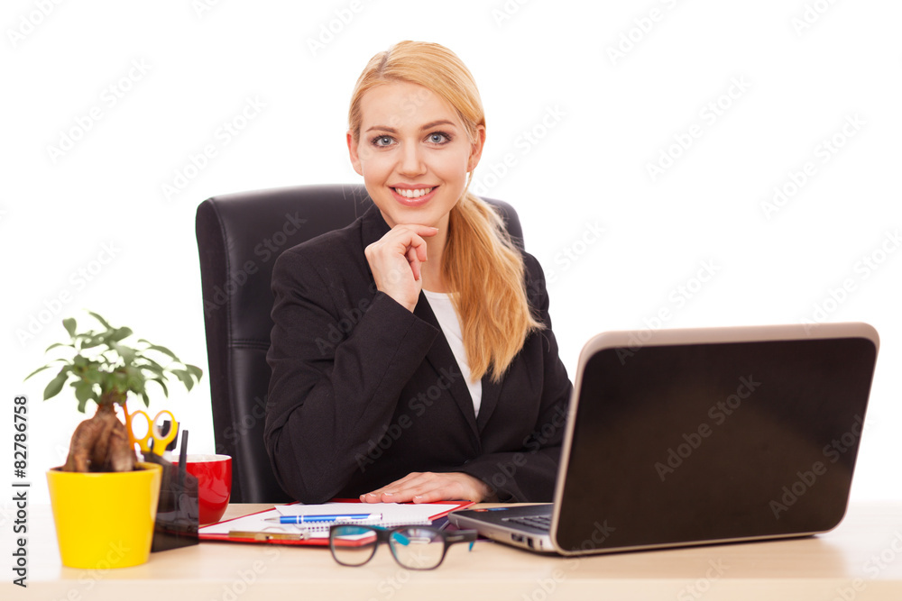 Young businesswoman in her office