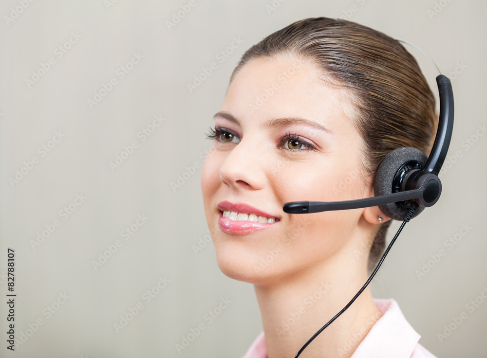 Customer Service Representative Wearing Headphones Customer Service Representative Wearing Headphones