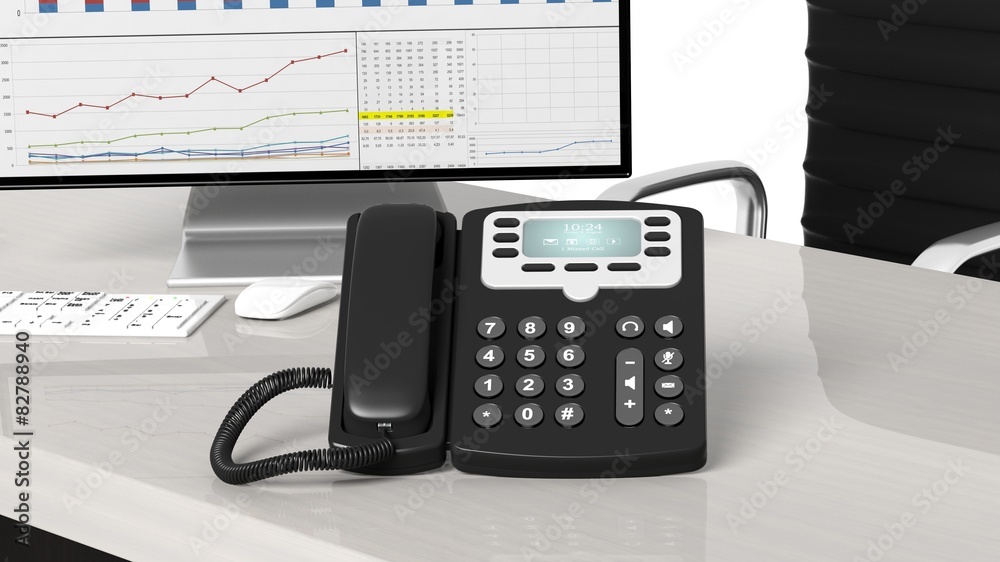 Black telephone closeup on office desk Black telephone closeup on office desk