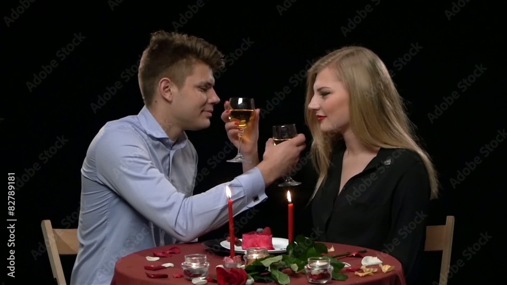 Lovely young couple having romantic dinner in restaurant, Slow Lovely young couple having romantic dinner in restaurant, Slow