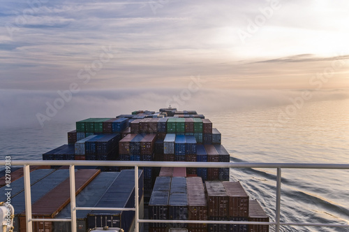 Container ship entering thick fog bank on English Channel