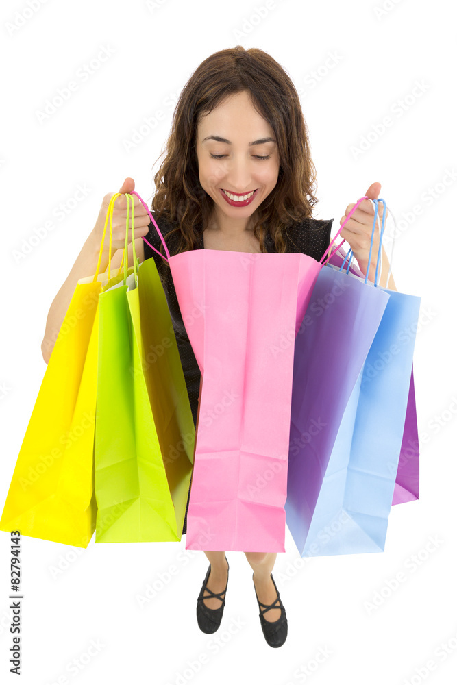 Curious gift woman looking into shopping bag